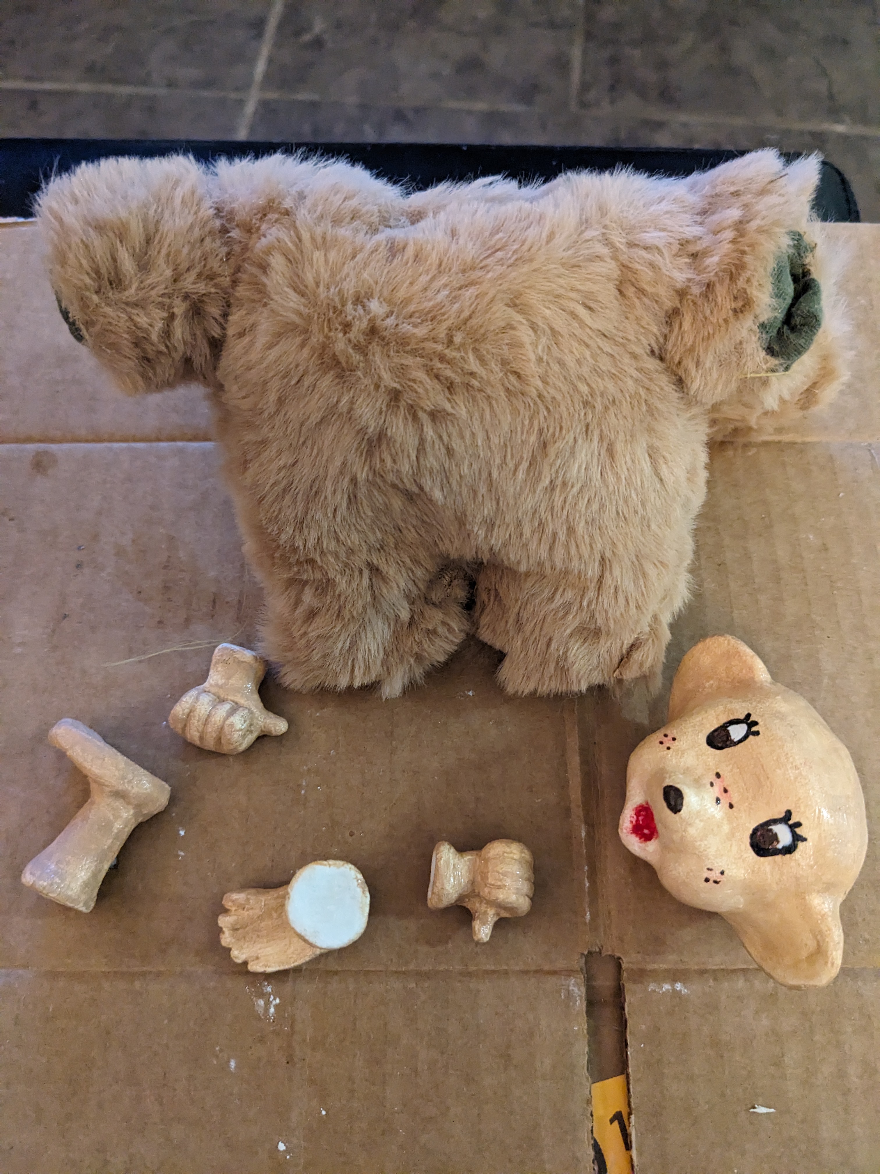 disassembled Monchhichi-type monkey toy