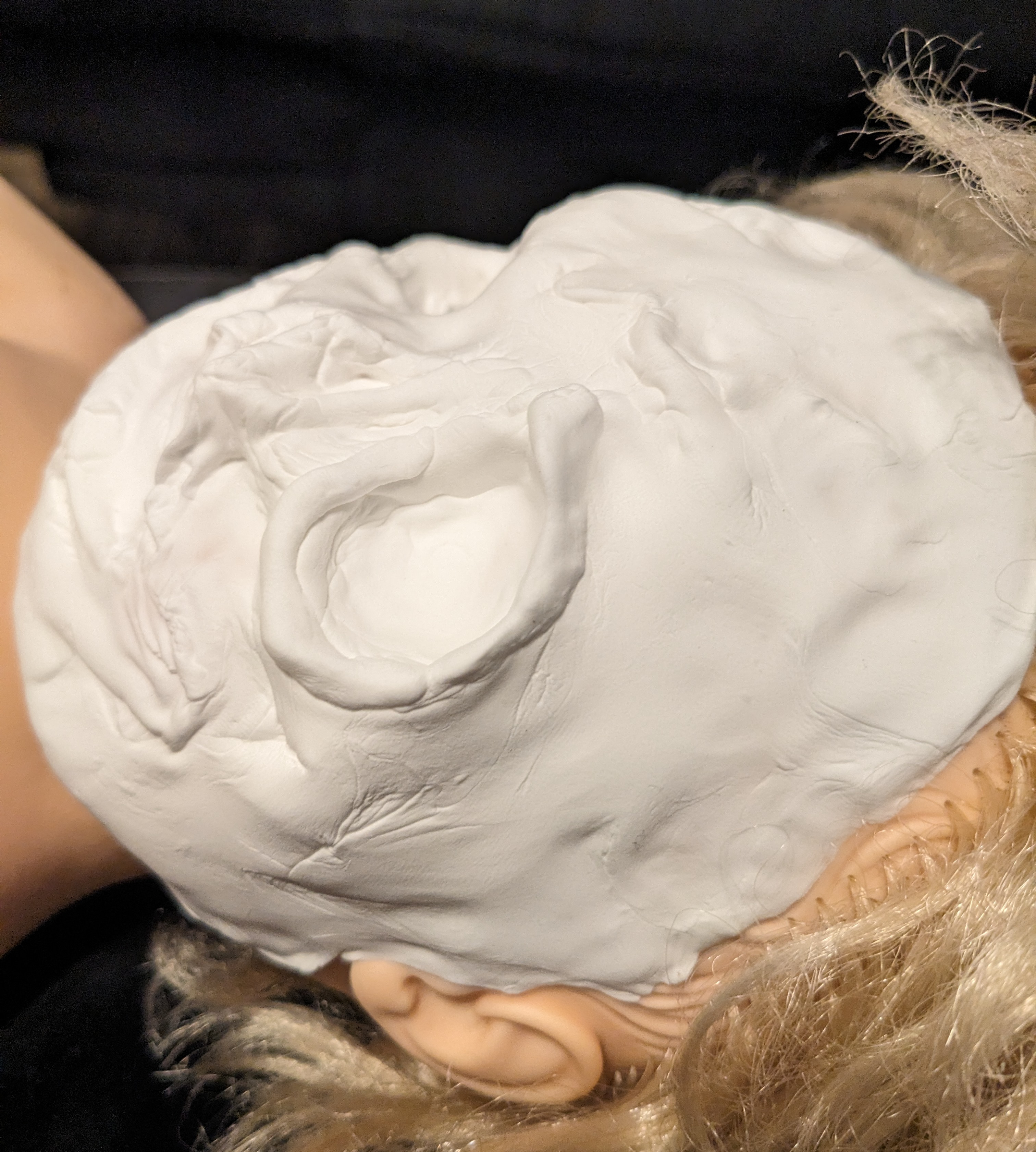 SofTina with clay molded over her face to look like Vicky Heyes